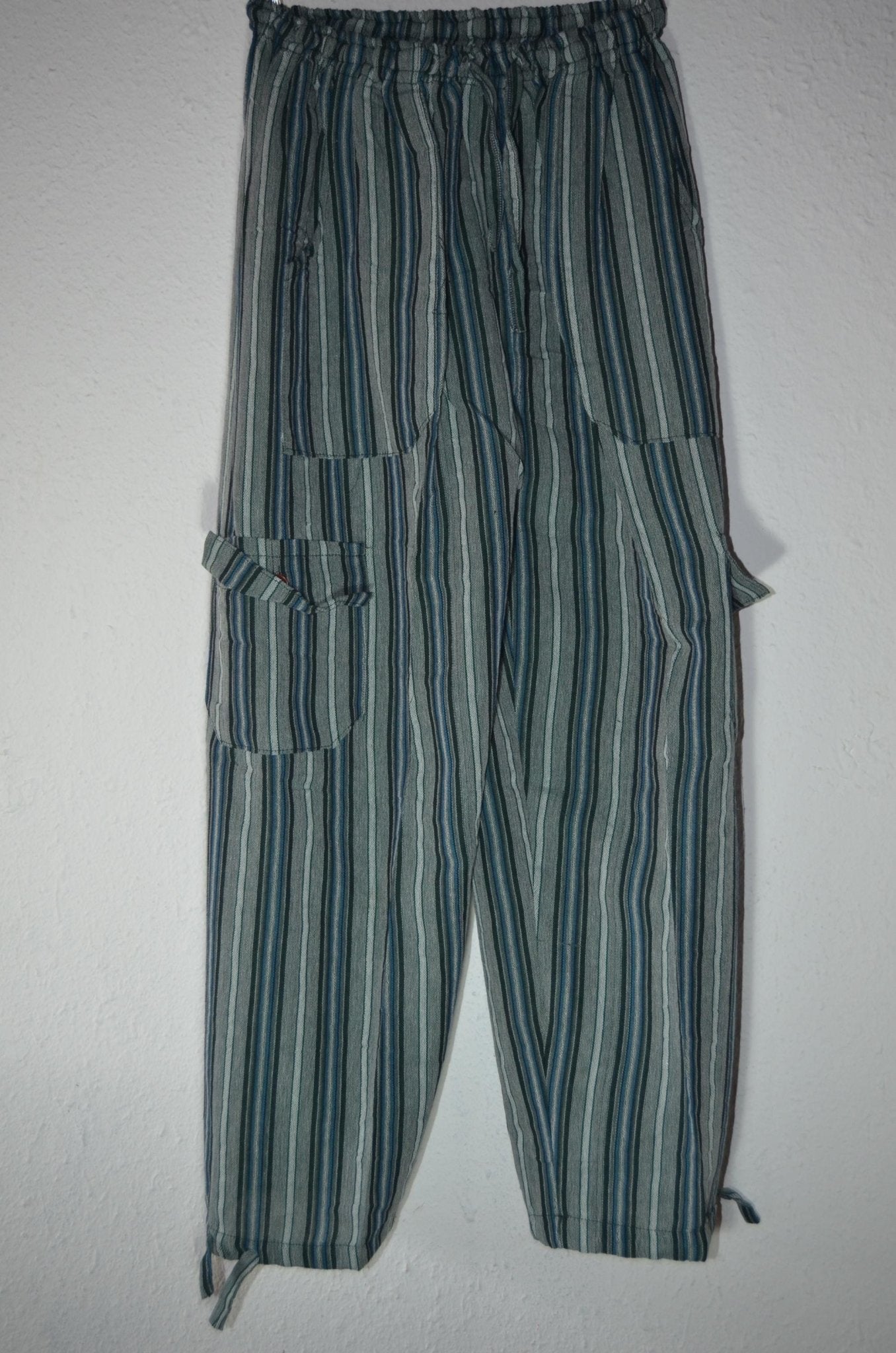 Handmade alpaca hippie pants with green and blue vertical stripes and cargo pocket.