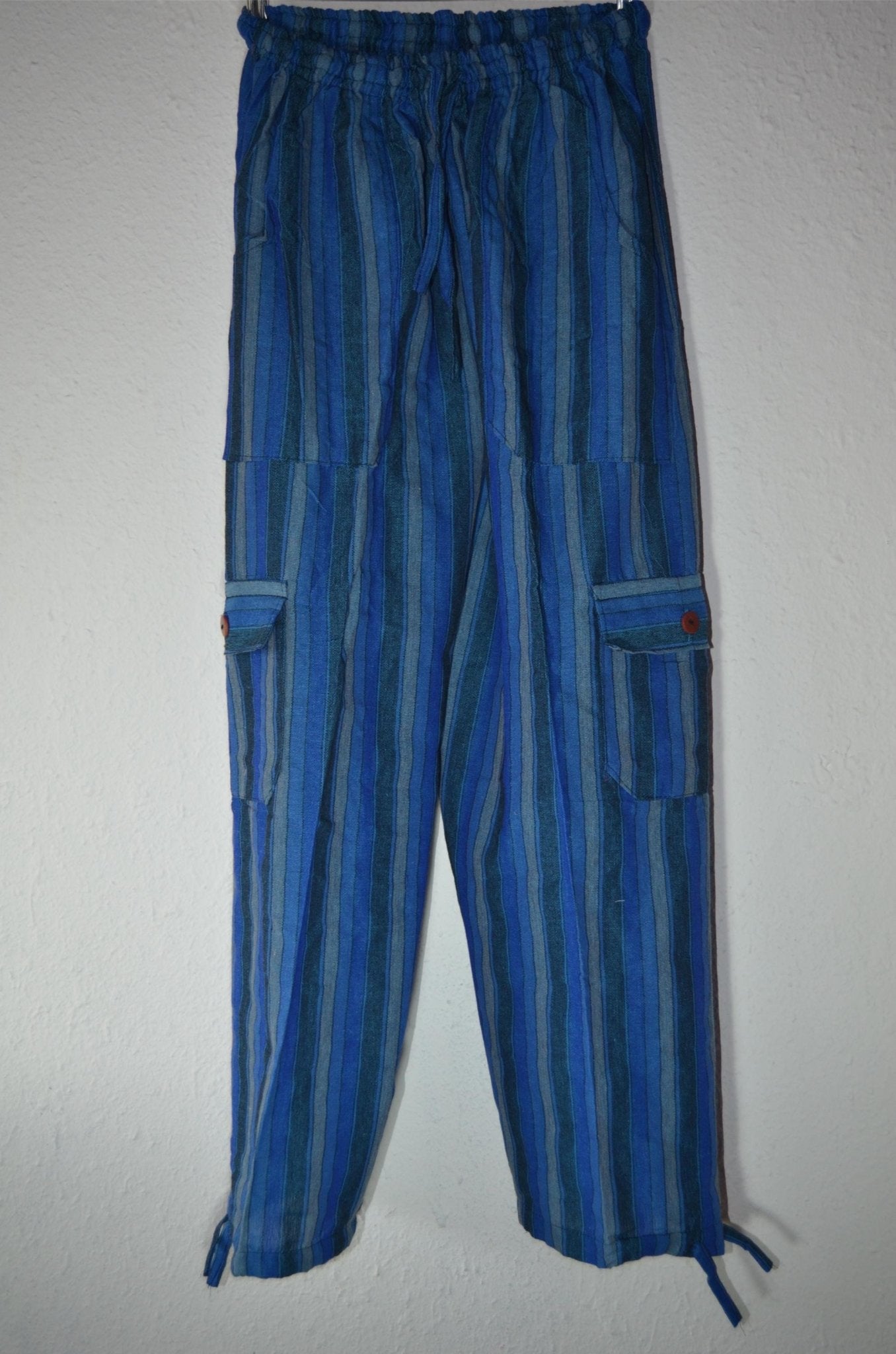 Handmade blue and green striped Peruvian alpaca hippie pants with adjustable ankle ties and side pockets.