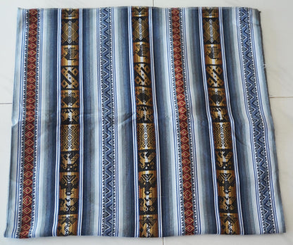 Handmade alpaca Mestana cloth with intricate Andean patterns in blue, brown, and white stripes.