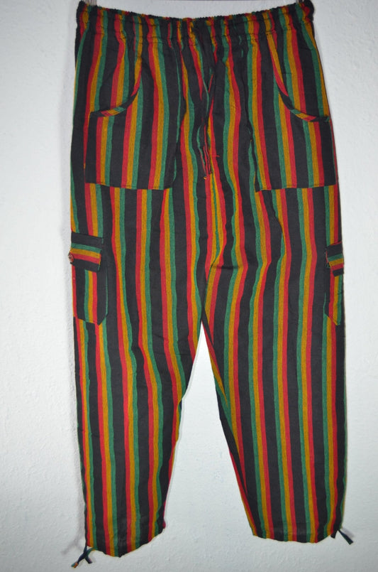 Handmade alpaca hippie pants with vertical red, green, yellow, and black stripes and patch pockets.